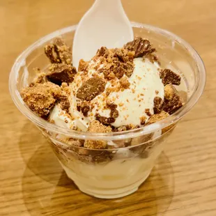 small cup vanilla topped with Reese's Cups