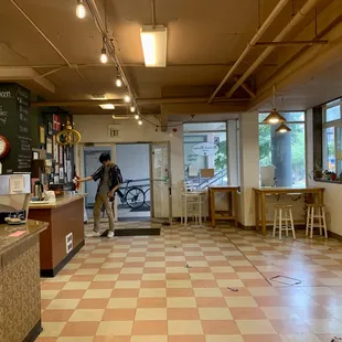 a cafe with a checkered floor