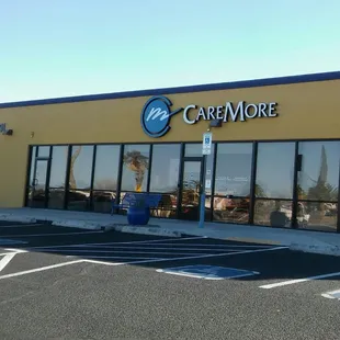 This is the north side of the building, facing the road. The entrance to Nifty After Fifty is at the far left. -E