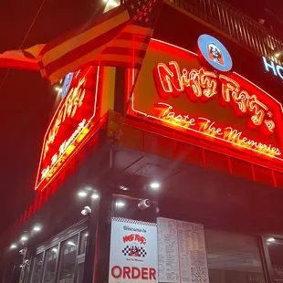 a neon sign for a restaurant