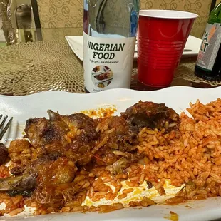 Mixed meat and jollof rice