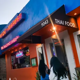 The entrance is a pop of color that continues inside. Love the vibe and energy.