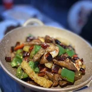 a bowl of stir fried vegetables