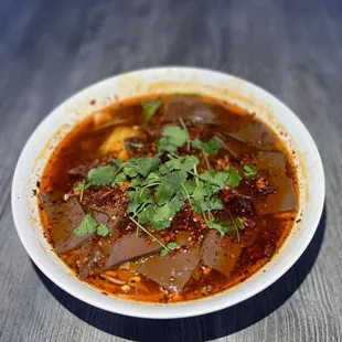 a bowl of soup on a table