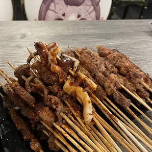 smacks, lamb, beef tongue, beef skewers, squid