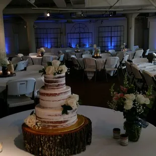 Cake and uplighting at Mellwood Room #1.