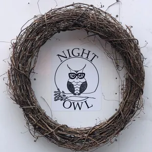 a wreath with a owl on it