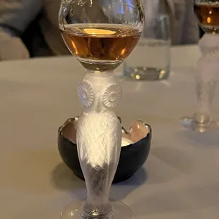 a glass of wine on a table