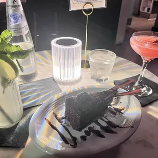 drink- Mojito (left)  Food- Slap Yo Momma Chocolate Cake (middle)  drink- Rasberry Lemon Drop (right)