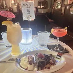 drink- Stowaway (left) food- Chocolate Flourless Cake (middle) drink- Rasberry Lemon Drop (right)