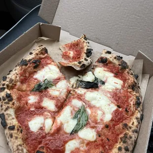 Fantastic pizza, too good to wait until I got home to take a bite!