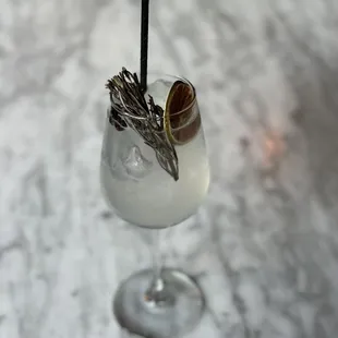 a close up of a glass with a drink in it