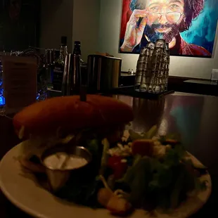 Jerry overseeing my meal of beer battered walleye sandwich