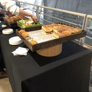 VIP tickets only: The food served: small sandwiches and vegetables.