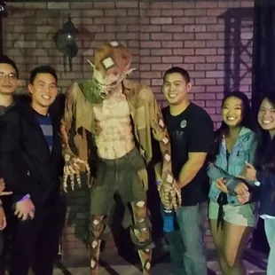 The coworkers with one of the many creepy things there!
