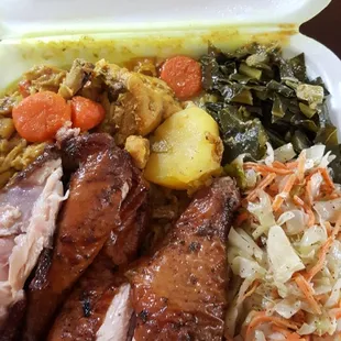 Curried chicken, jerk chicken, greens and cabbage