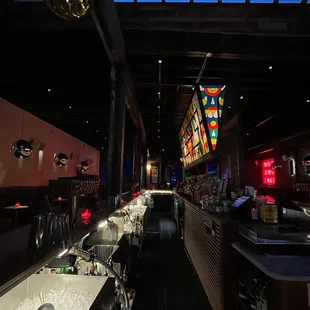 a restaurant with a long bar