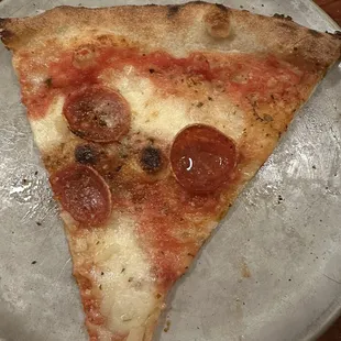 Last slice of pepperoni pizza... I promise the pepperoni was more evenly distributed across the pizza.