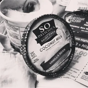 a container of coconut milk and a cup of ice cream