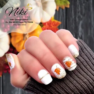 At Niki Nails &amp; Spa, we're celebrating autumn with nail designs that capture the beauty of the season.