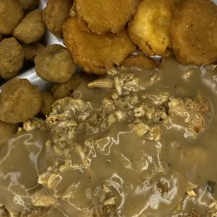Smothered Chicken Tenders Over Rice w/ Gravy, okra and fried squash