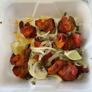 $14.99 Chicken Tikka. I was assured it would be enough to feed 2 people. It was $14.99 just for this---the naan was a separate purchase.