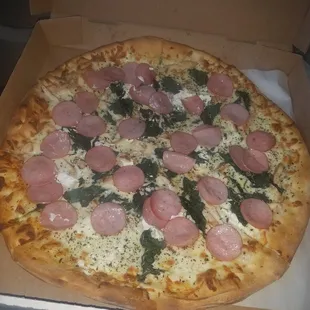 Cold canadian bacon on top of hot pizza. No thanks.