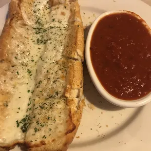 Garlic bread (added cheese + marinara sauce )