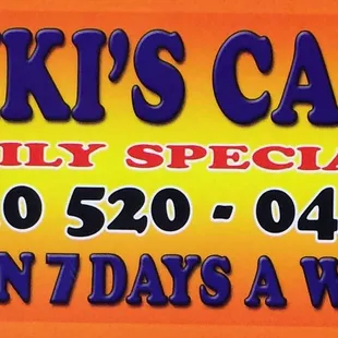 a sign for niki's cafe