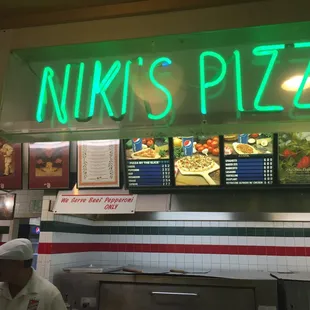 neon sign above the counter