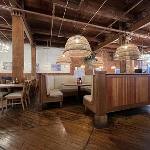 a restaurant with wood floors