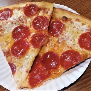 Two slices of delish greasy pepperoni!