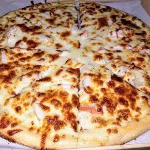 Crab Pizza for lent. Crab, house made Alfredo, mozzarella.  Very good.