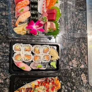 Sushi &amp; Sashimi Combo (top) Spicy Salmon Roll (center) Volcano Roll (bottom)