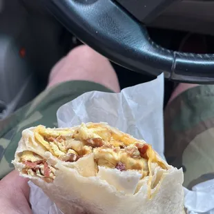 Bacon eggs cheese and potatoes
