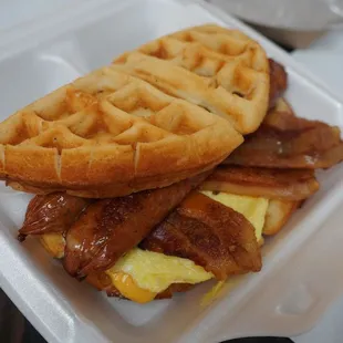 Waffle sandwich with bacon and hot link