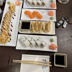 Gyoza, Salmon Sashimi, Tempura Philly roll, Spicy Tuna roll