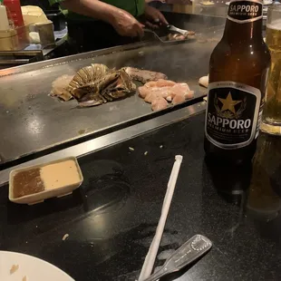 Seafood and chicken and Sapporo