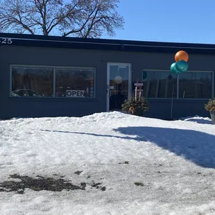 Front of the shop, plenty of street and parking lot parking