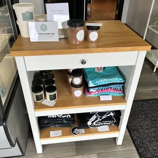 a shelf of coffee and other items