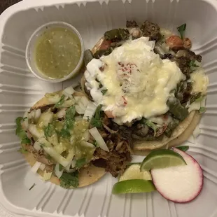 Bottom left carnitas, top right nopales
