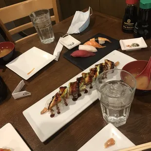 a variety of sushi on plates