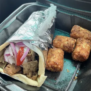 Lamb and beef gyro and barrel tots
