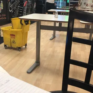 a table and chairs in a restaurant