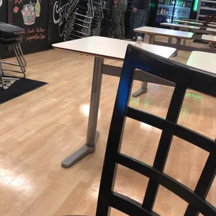 a table and chairs in a restaurant