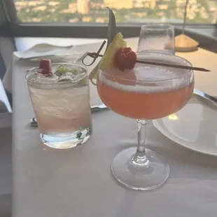 two cocktails on a table