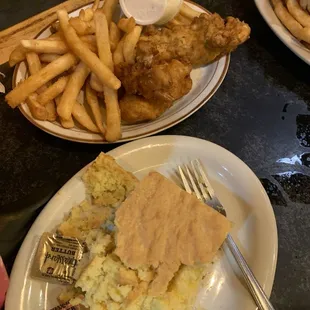 Kiddie meal - 2 chicken strips and fries. (My granddaughter attacked with her 1 y.o. fingers my cornbread) lol