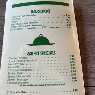 a person holding a menu