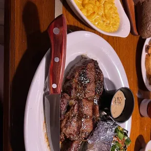 Ribeye, mac &amp; cheese, and baked potato