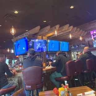 people sitting at the bar